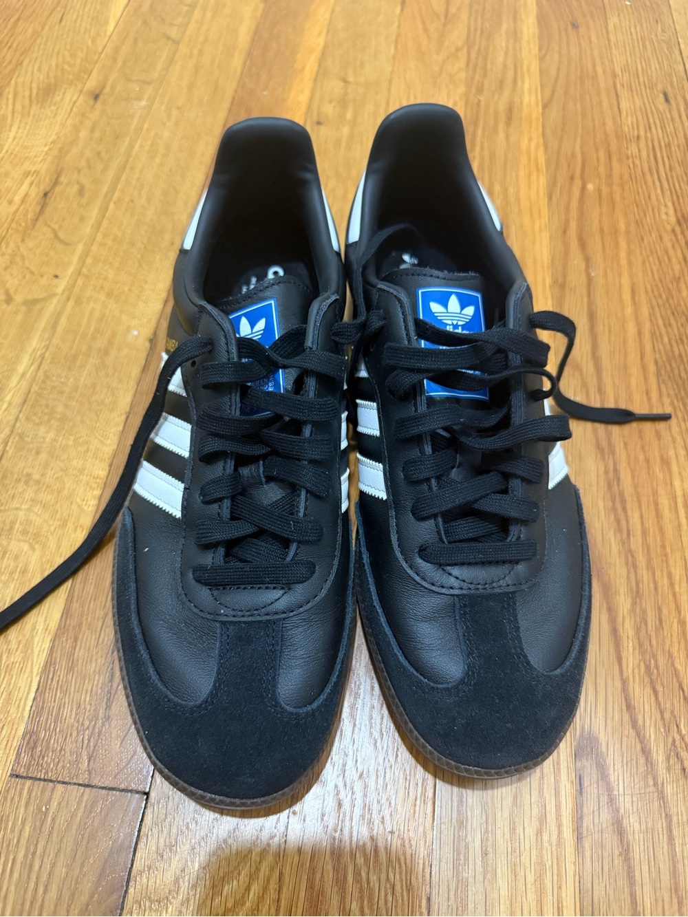 adidas Black Sneakers with White Stripes and Blue Tongue Logo
